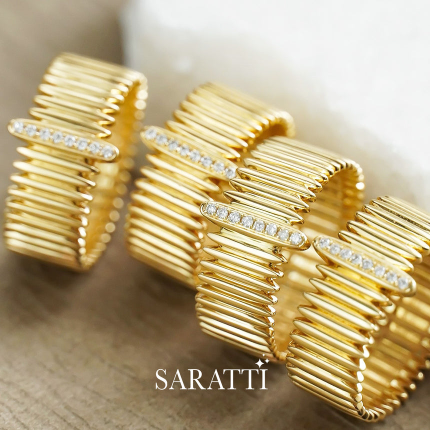 Elegant 18K yellow gold ring showcasing a linear diamond bar and architectural texture | SARATTI
