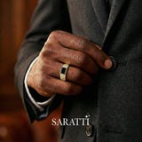 6mm mens wedding band with black diamond worn on hand in 18K yellow gold | SARATTI