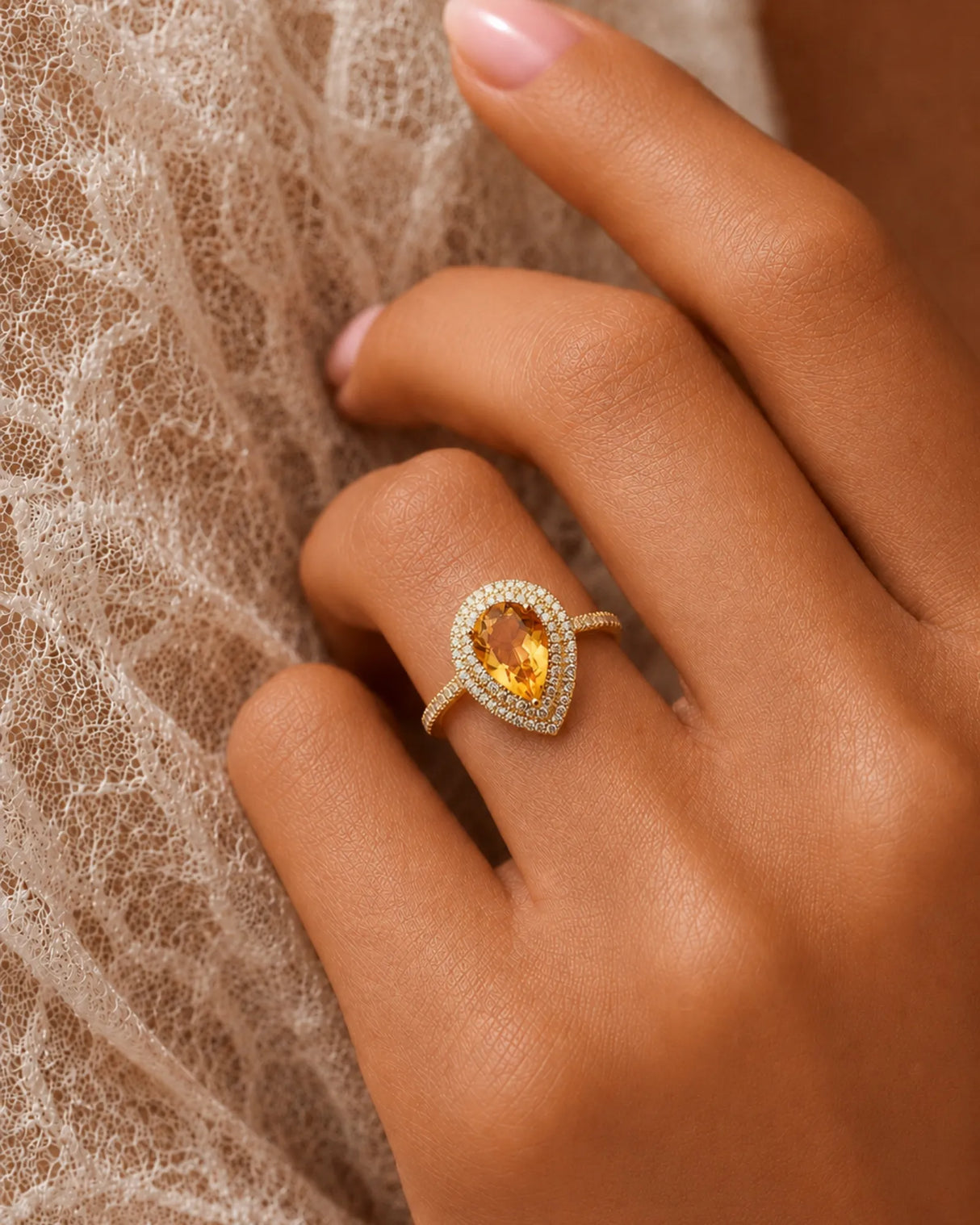 Vintage-inspired citrine ring featuring layered round diamonds and a sculpted 18K yellow gold gallery | SARATTI