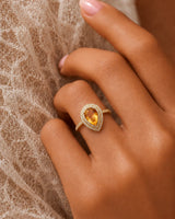 Vintage-inspired citrine ring featuring layered round diamonds and a sculpted 18K yellow gold gallery | SARATTI