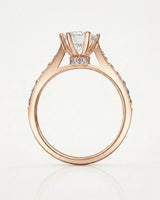 Vintage-inspired rose gold moissanite engagement ring designed for an intimate proposal | SARATTI