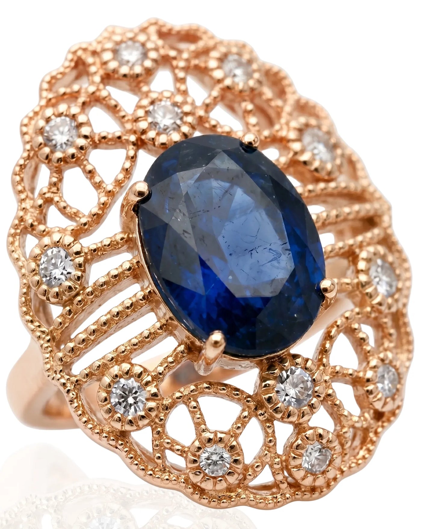 Vintage-inspired sapphire ring with open lace filigree design in rose gold | SARATTI
