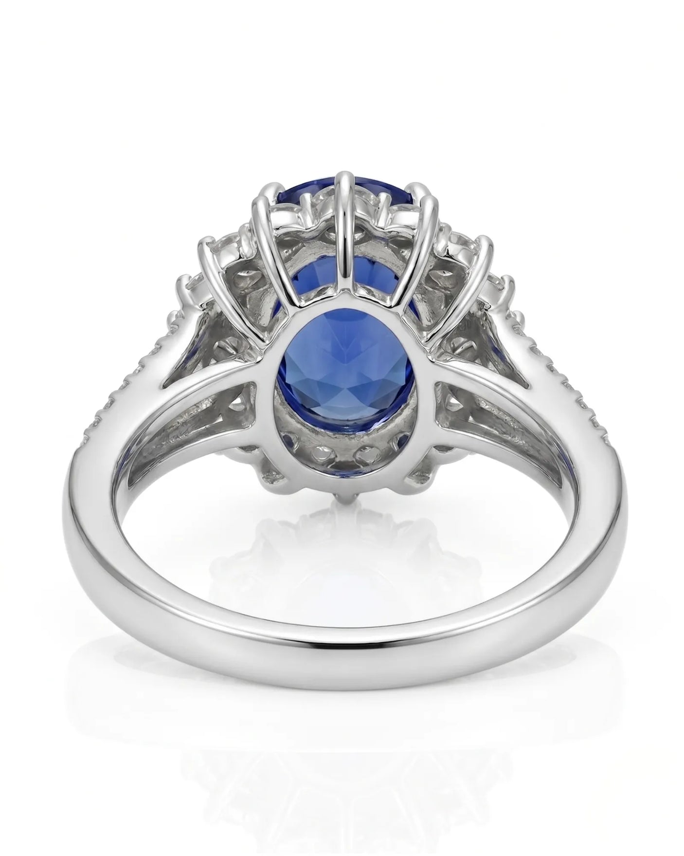 Vintage-inspired sapphire ring with tapered baguette diamonds and polished platinum setting | SARATTI