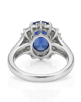 Vintage-inspired sapphire ring with tapered baguette diamonds and polished platinum setting | SARATTI