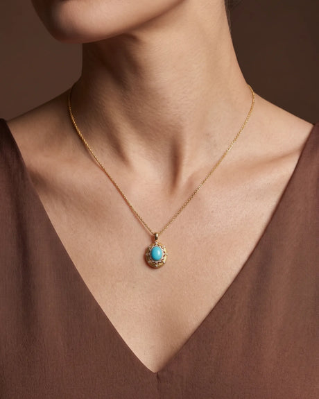 Vintage-inspired turquoise pendant necklace with ornamental diamond surround and hand-brushed 18K gold detailing | SARATTI