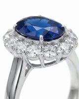 Vintage halo sapphire ring with classic diamond accents in 18K white gold | SARATTI