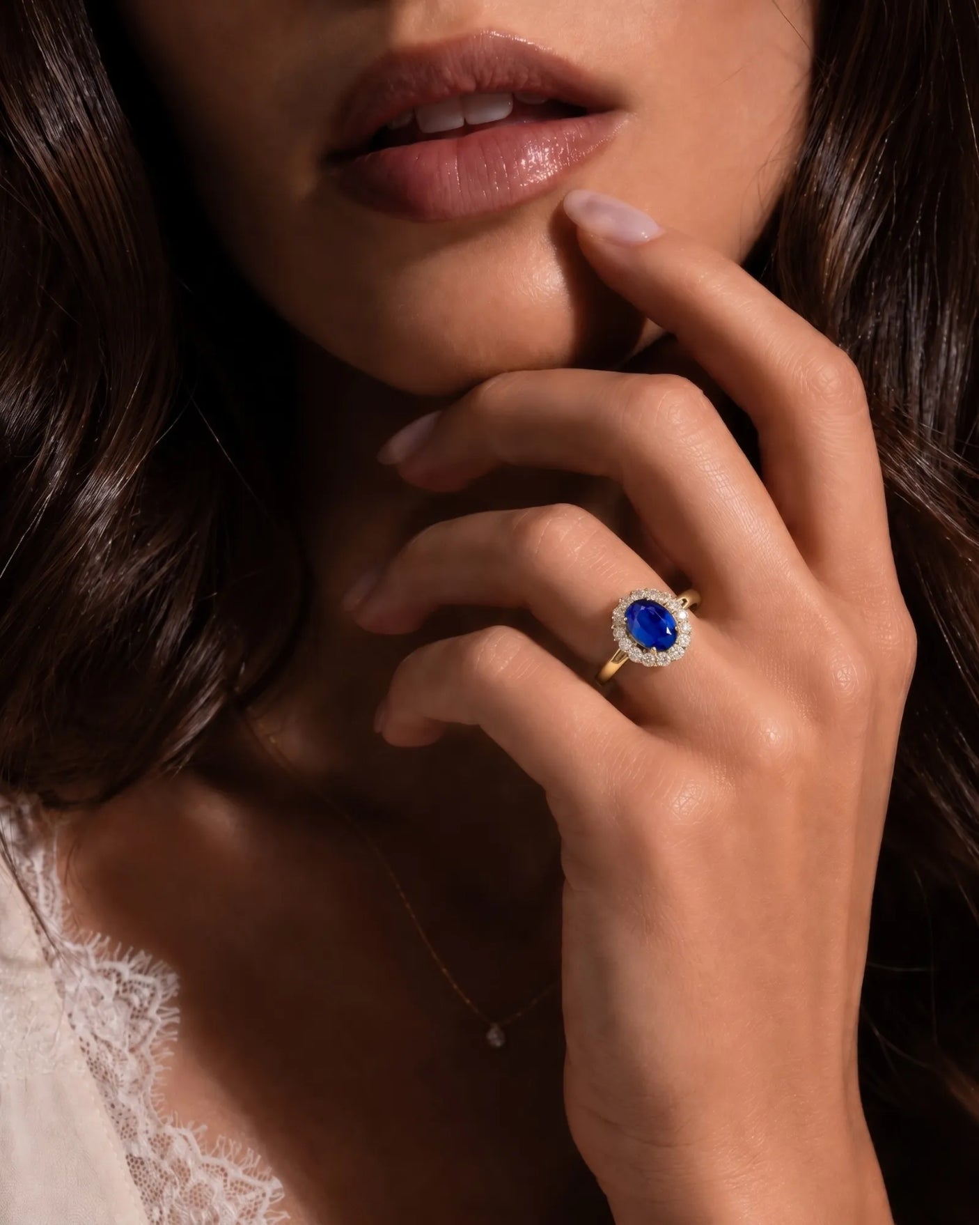 Vintage halo sapphire ring with classic diamond accents in 18K yellow gold | SARATTI
