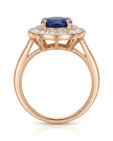 Vintage sapphire engagement ring with architectural diamond halo and channel shoulders in 18K rose gold | SARATTI