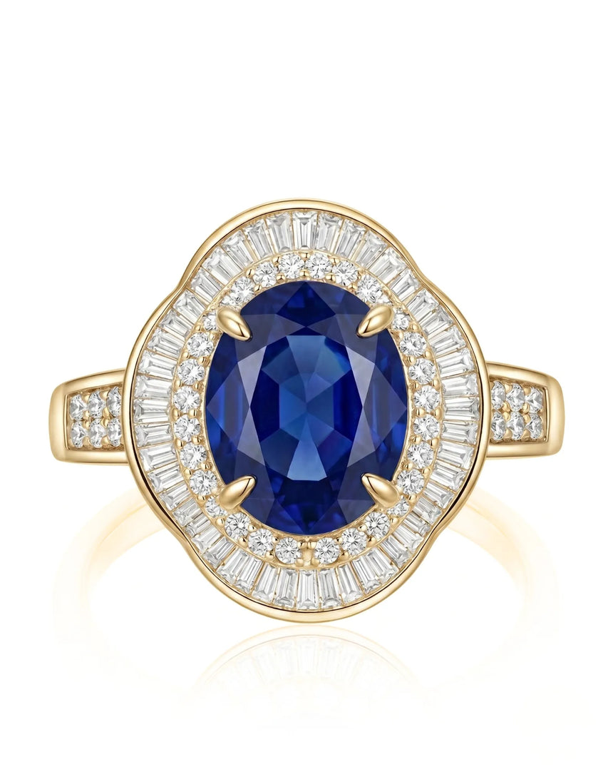 Vintage sapphire engagement ring with architectural diamond halo and channel shoulders in 18K yellow gold | SARATTI