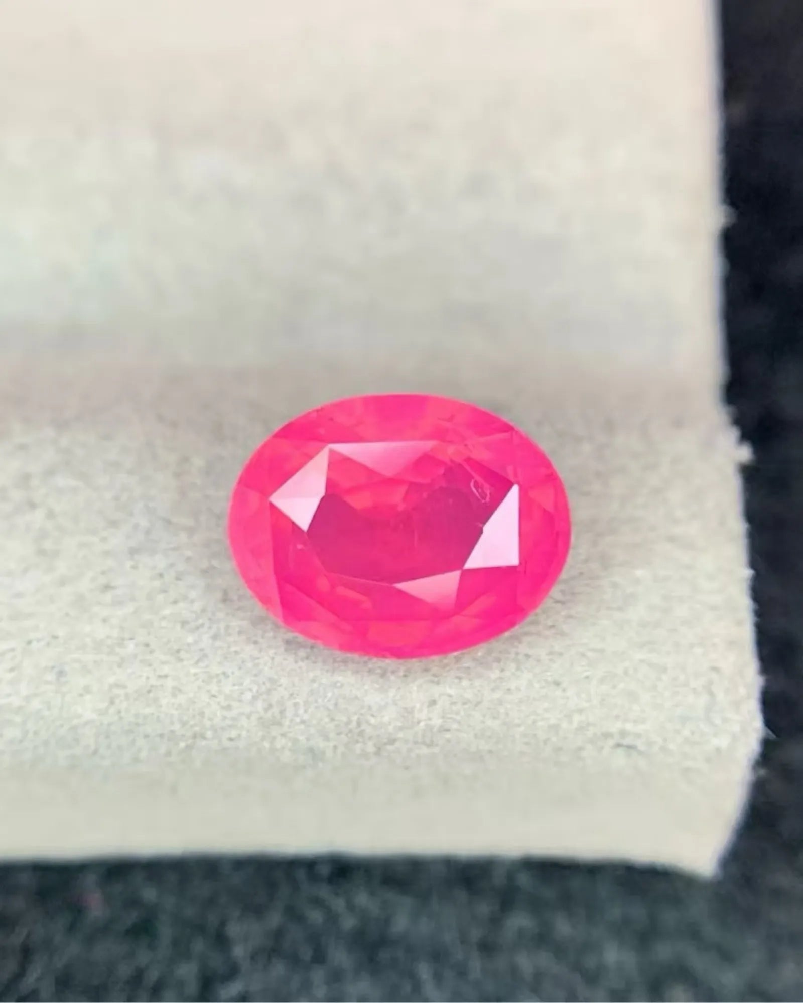 Vivid Orangy Pink Spinel measuring 9.19 x 7.14 x 4.93mm | SARATTI