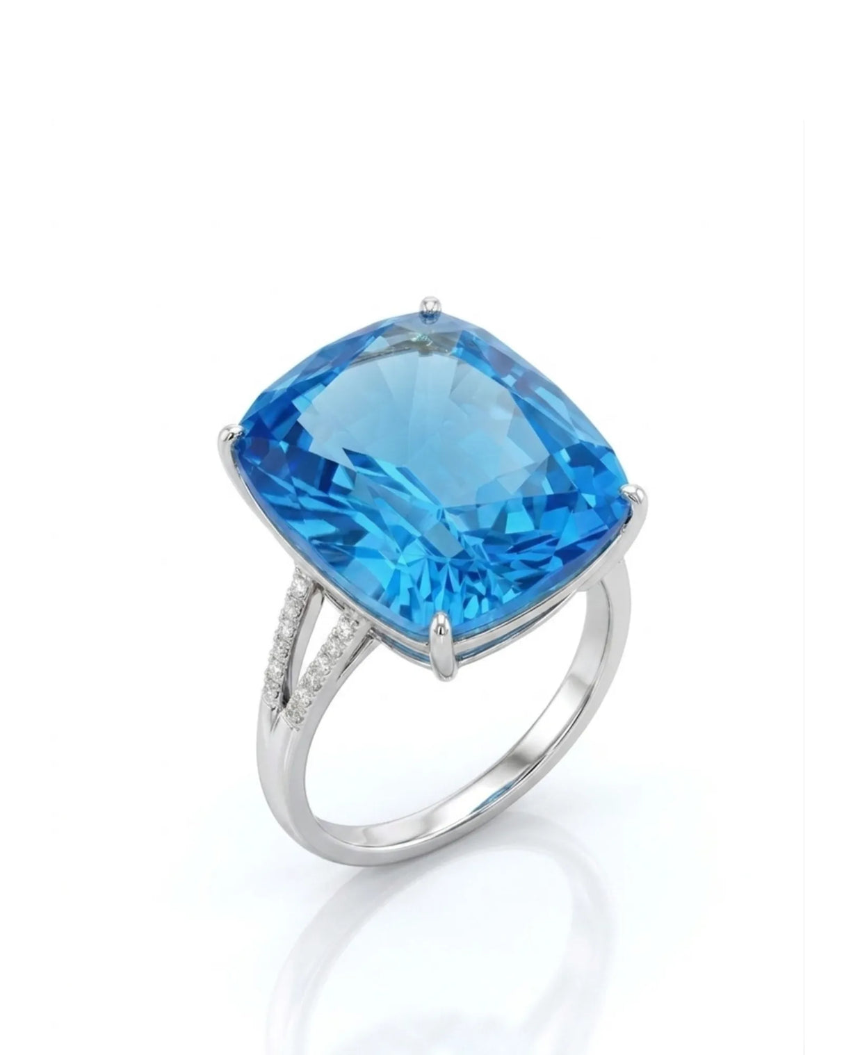 Vivid Swiss Blue cushion topaz ring with diamond split shank in polished platinum | SARATTI
