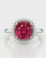 Vivid crimson oval tourmaline ring framed by natural diamonds in 18K white gold | SARATTI