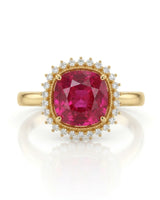 Vivid crimson oval tourmaline ring framed by natural diamonds in 18K yellow gold | SARATTI