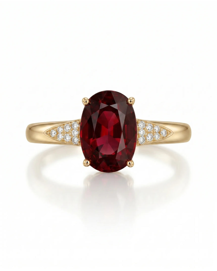 Vivid deep red oval garnet ring with natural diamond accents in 18K yellow gold | SARATTI