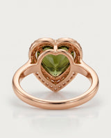 Vivid green heart tourmaline ring framed by natural diamonds in 18K rose gold | SARATTI