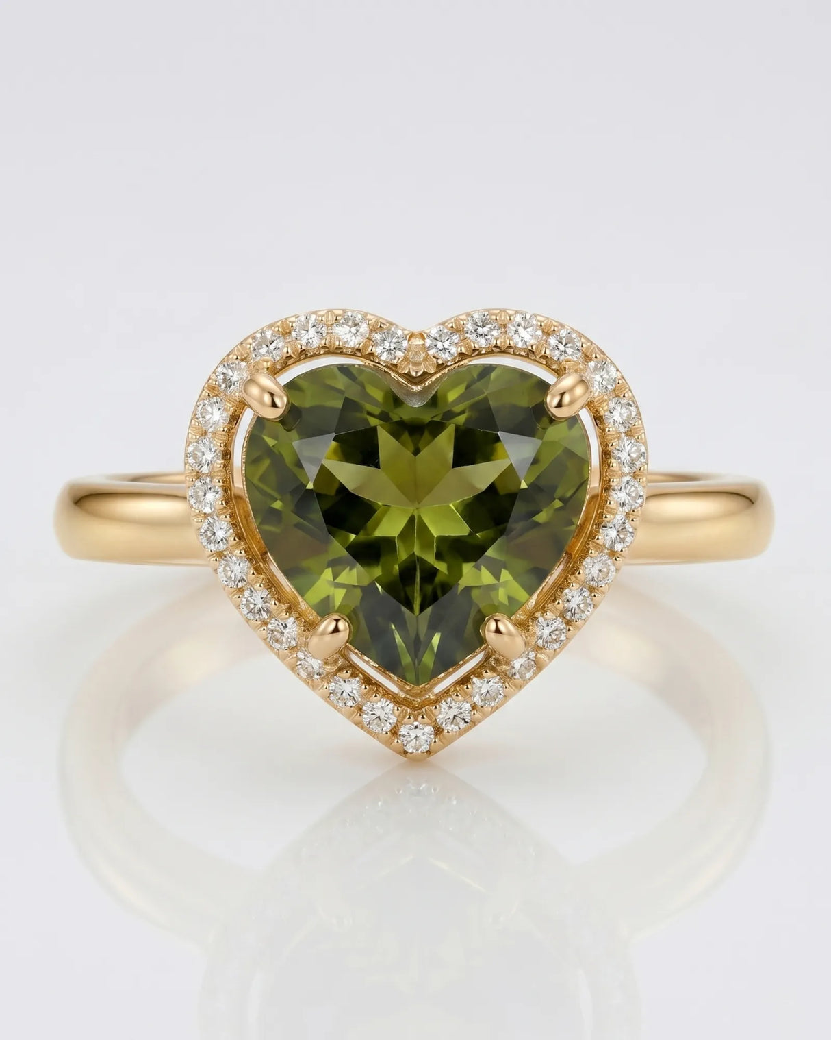 Vivid green heart tourmaline ring framed by natural diamonds in 18K white gold | SARATTI