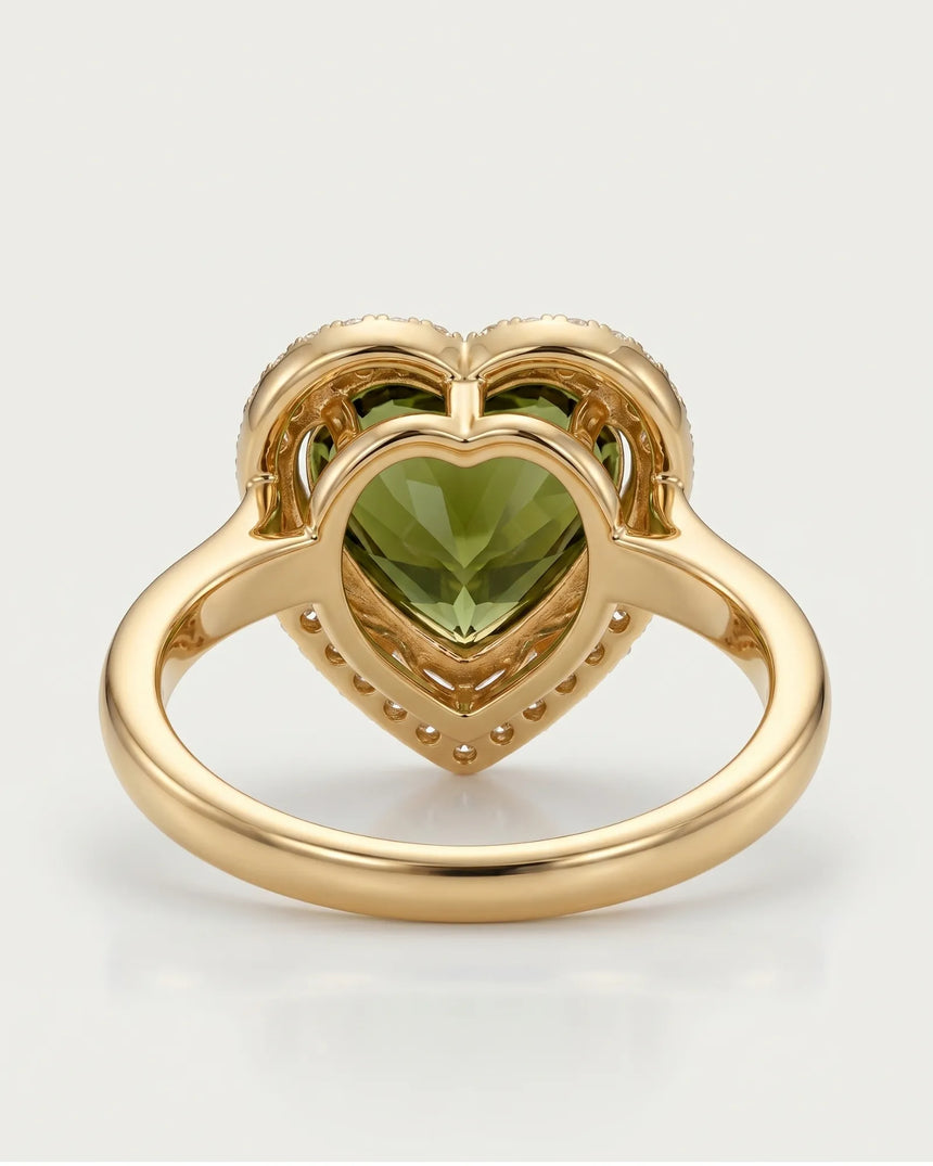 Vivid green heart tourmaline ring framed by natural diamonds in 18K yellow gold | SARATTI