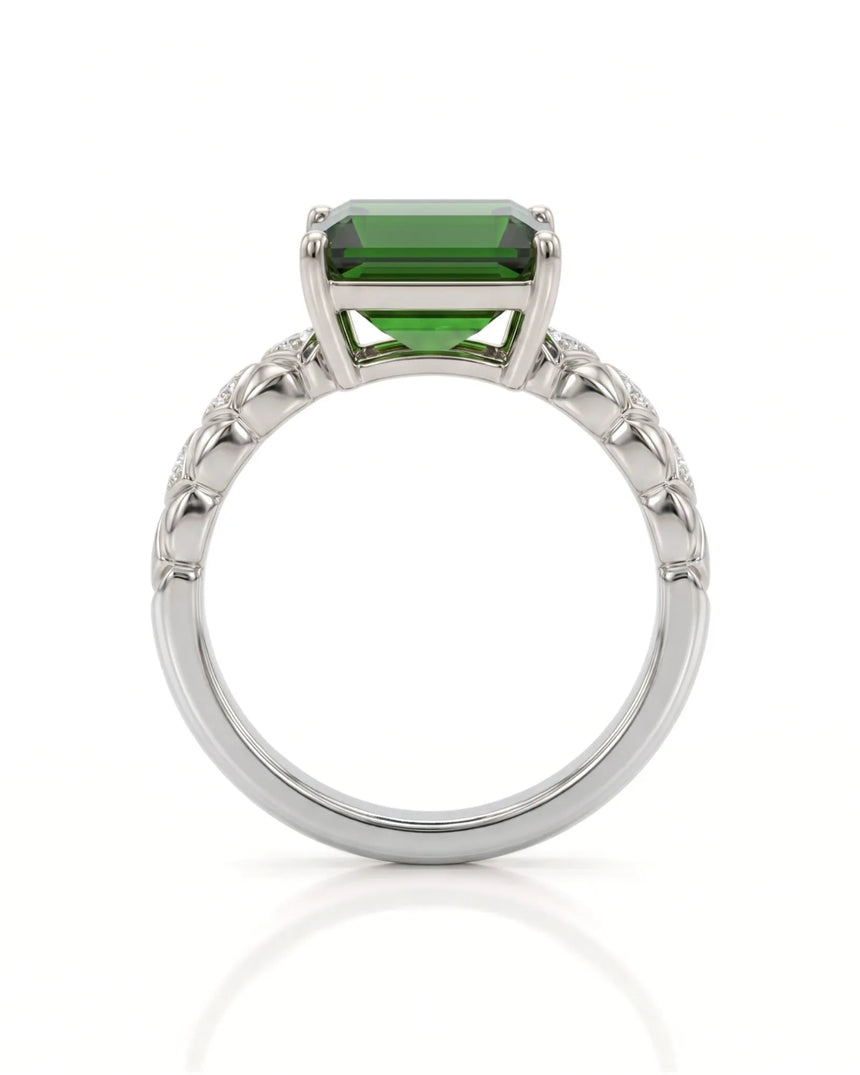 Vivid green tourmaline ring with sculpted diamond shoulders in platinum | SARATTI