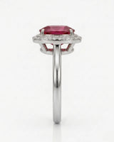 Vivid pink oval tourmaline ring framed by natural diamonds in 18K white gold | SARATTI
