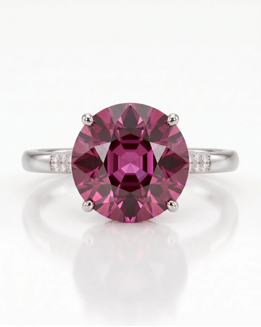 Vivid pink oval tourmaline ring with refined diamond shoulders in 18K white gold | SARATTI