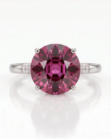 Vivid pink oval tourmaline ring with refined diamond shoulders in platinum | SARATTI