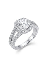 White gold cushion moissanite engagement ring with halo, split shank, and matching wedding band | SARATTI