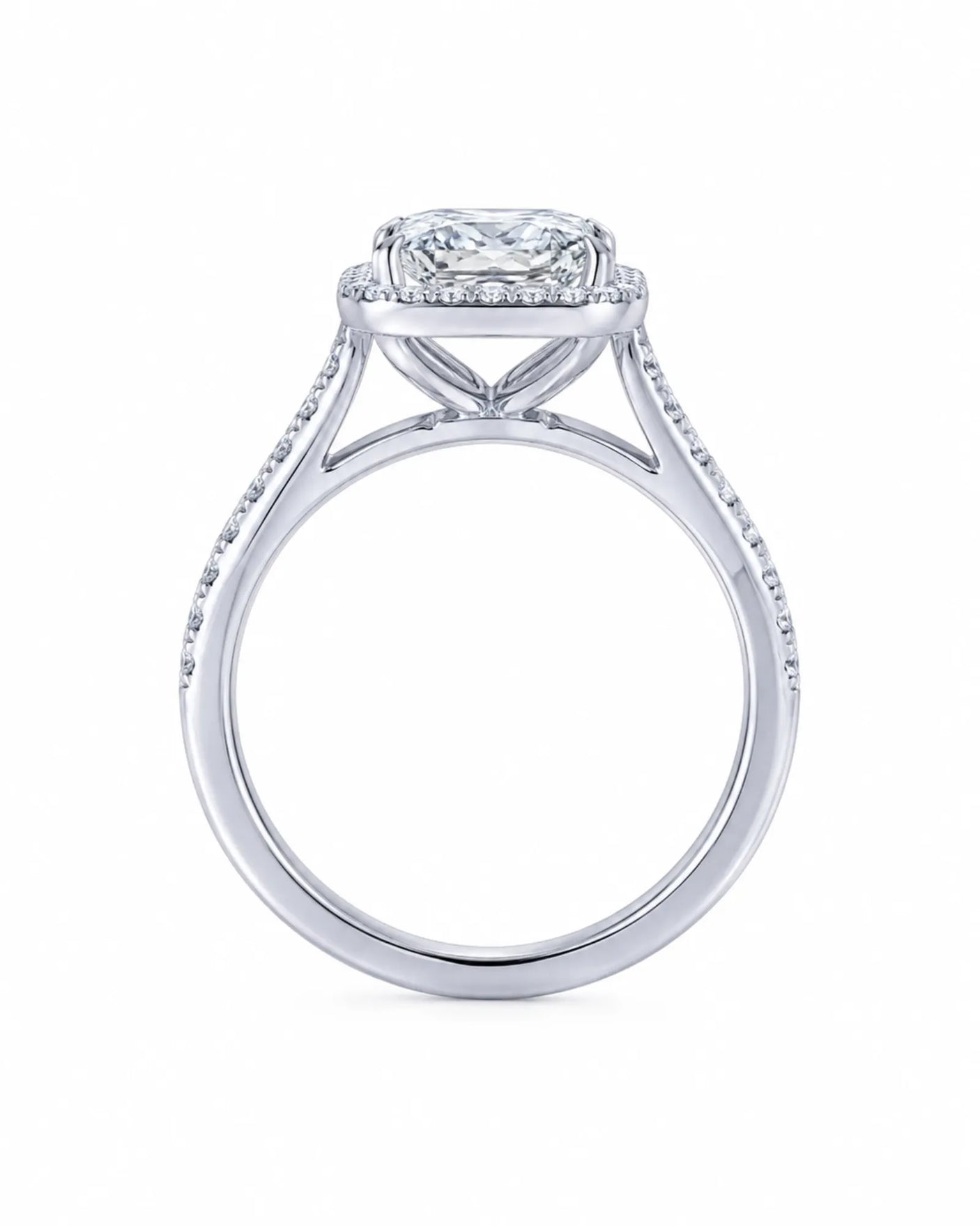 White gold halo moissanite engagement ring created for a refined modern proposal | SARATTI