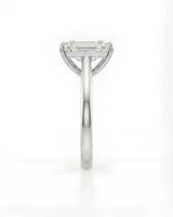 White gold moissanite engagement ring for a sophisticated proposal with timeless emerald-cut elegance | SARATTI
