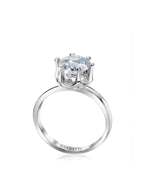 White gold moissanite engagement ring with round center stone and sculpted six-prong solitaire setting | SARATTI