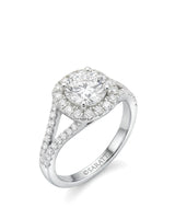 White gold moissanite halo bridal set with round center, split shank ring, and curved pavé band | SARATTI