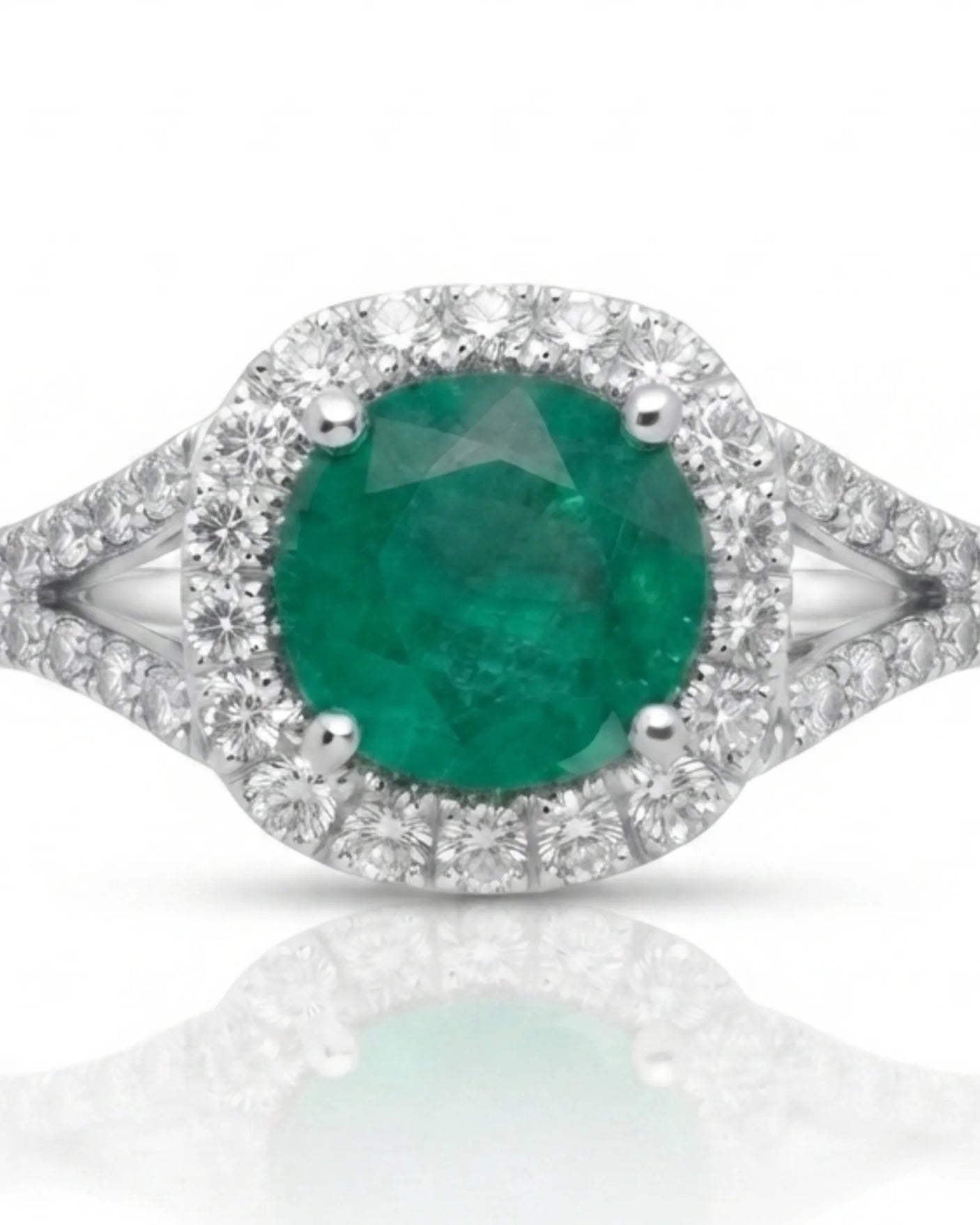 White gold natural emerald engagement ring with moissanite halo, split shank, and curved wedding band | SARATTI.