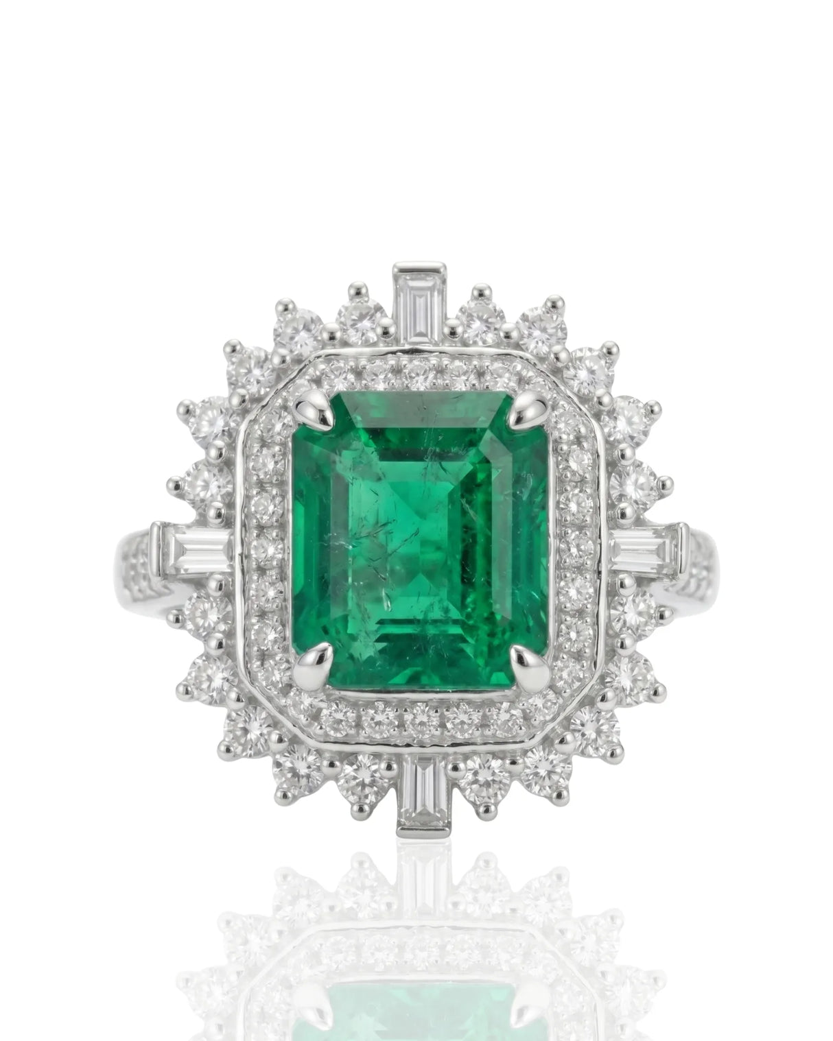 White gold natural emerald statement ring with round and baguette diamond accents | SARATTI