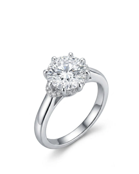 White gold round moissanite engagement ring with eight-prong floral basket and hidden halo | SARATTI