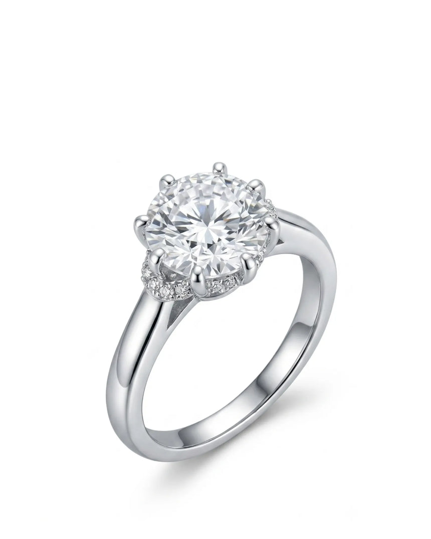 White gold round moissanite engagement ring with eight-prong floral basket and hidden halo | SARATTI