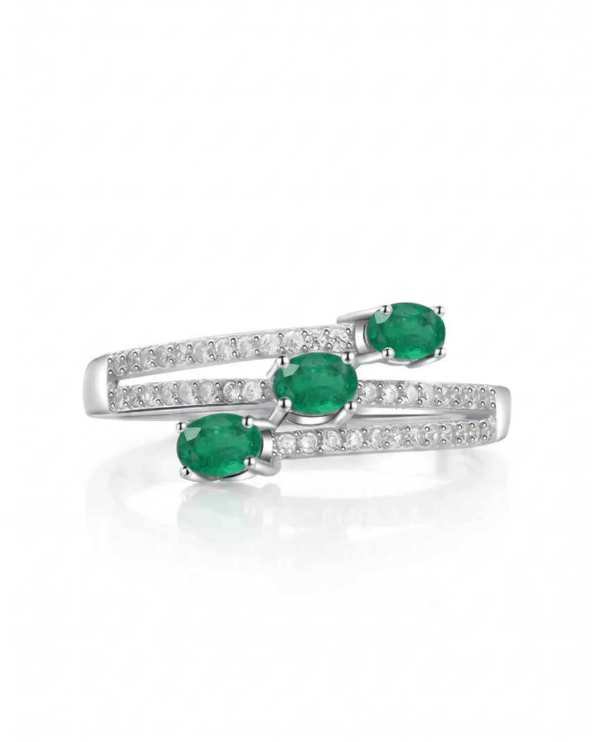 Wrap style emerald and diamond ring in Platinum | SARATTI
