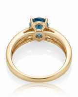 Yellow gold aquamarine ring with flowing split shank and pavé diamonds | SARATTI