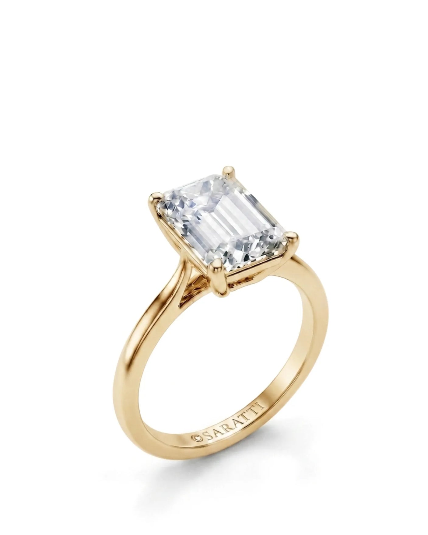 Yellow gold emerald-cut moissanite engagement ring with four-prong solitaire setting and polished band | SARATTI