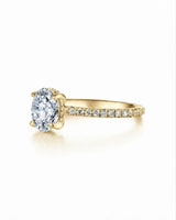 Yellow gold hidden halo moissanite engagement ring for a warm romantic proposal | SARATTI