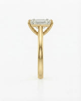Yellow gold moissanite engagement ring for a sophisticated proposal with timeless emerald-cut elegance | SARATTI