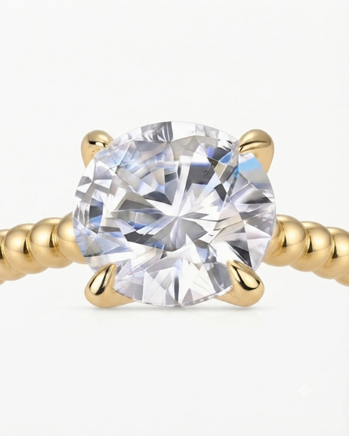 Yellow gold moissanite engagement ring for a warm proposal with distinctive beaded craftsmanship | SARATTI