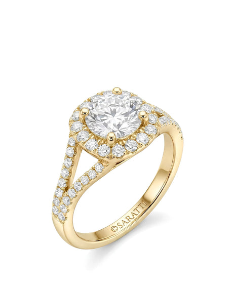 Yellow gold moissanite halo bridal set with round center, split shank ring, and curved pavé band | SARATTI