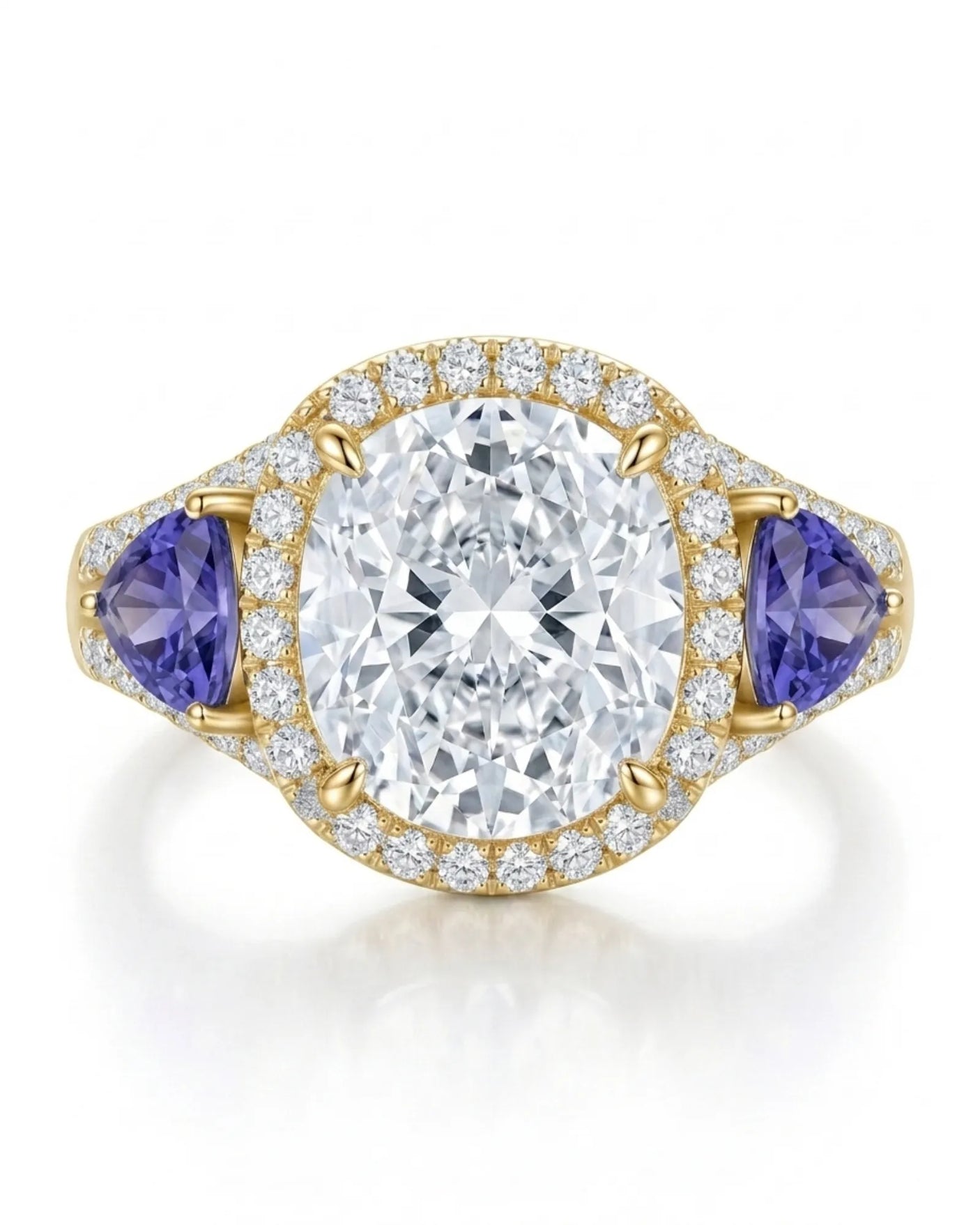 Yellow gold moissanite ring with cushion center, halo, and tanzanite accents | SARATTI
