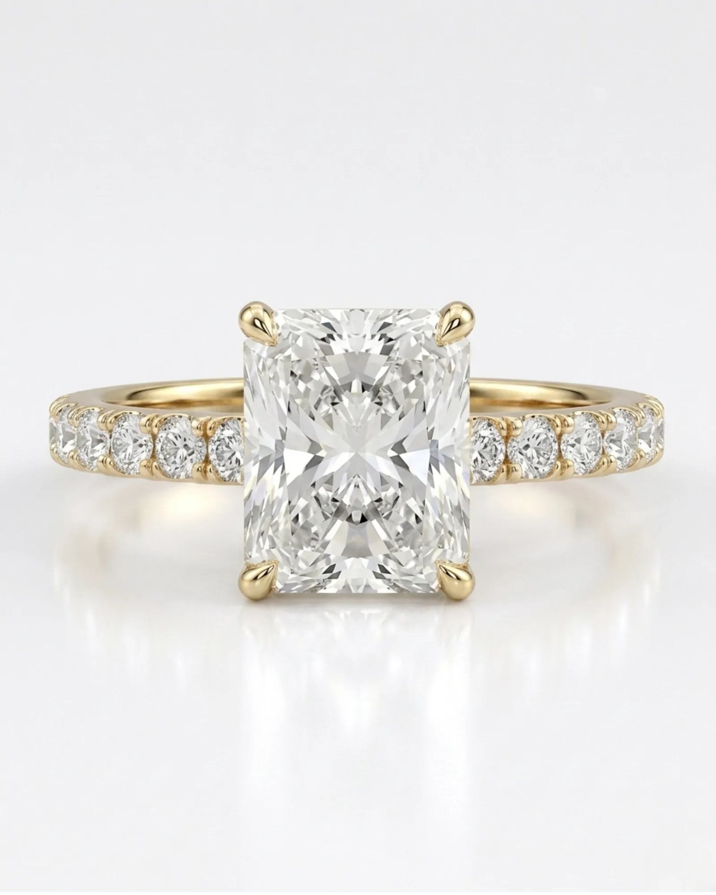 Yellow gold moissanite ring with radiant center and refined pavé band | SARATTI