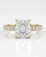 Yellow gold moissanite ring with radiant center and refined pavé band | SARATTI
