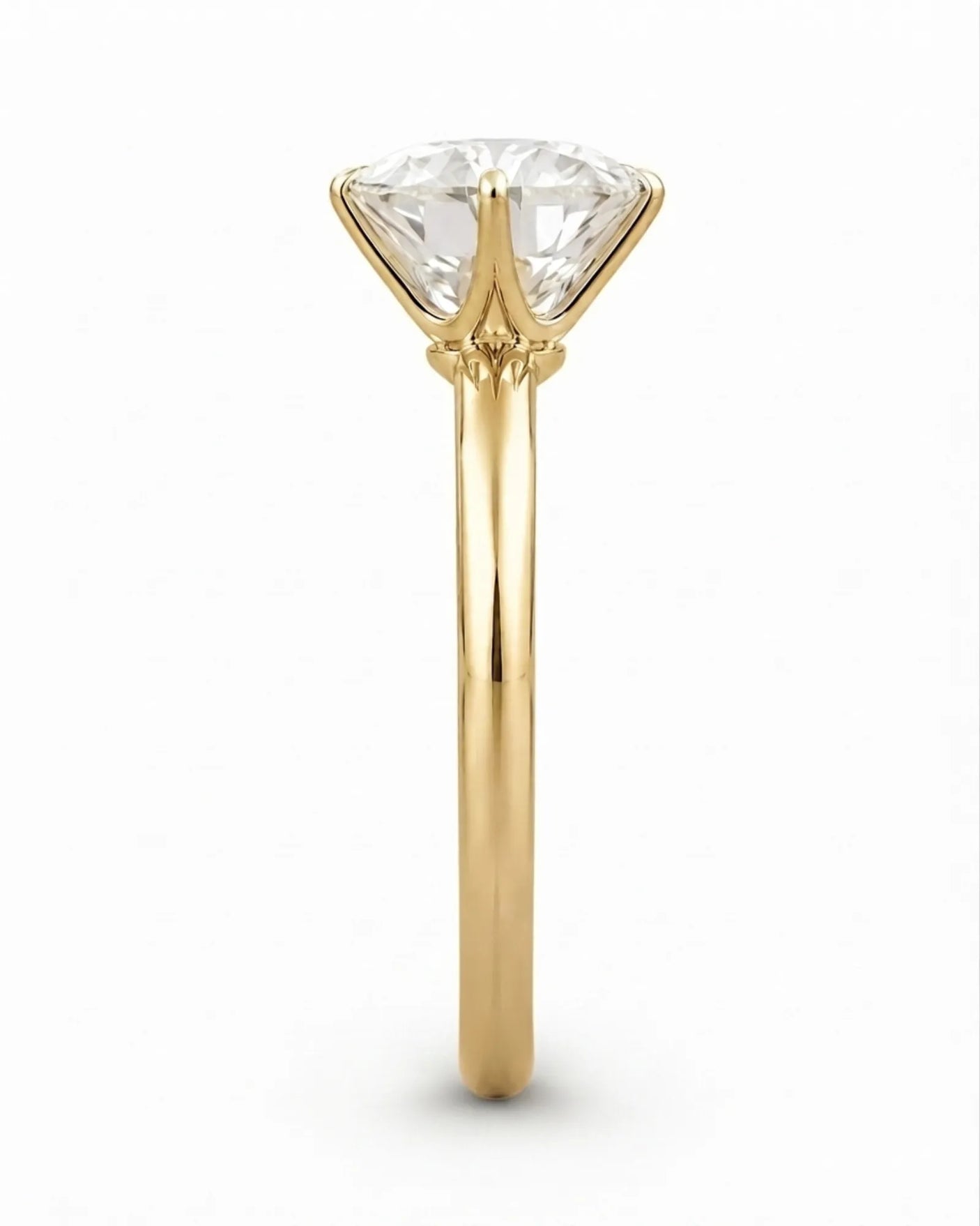 Yellow gold moissanite solitaire engagement ring for a warm and timeless proposal | SARATTI