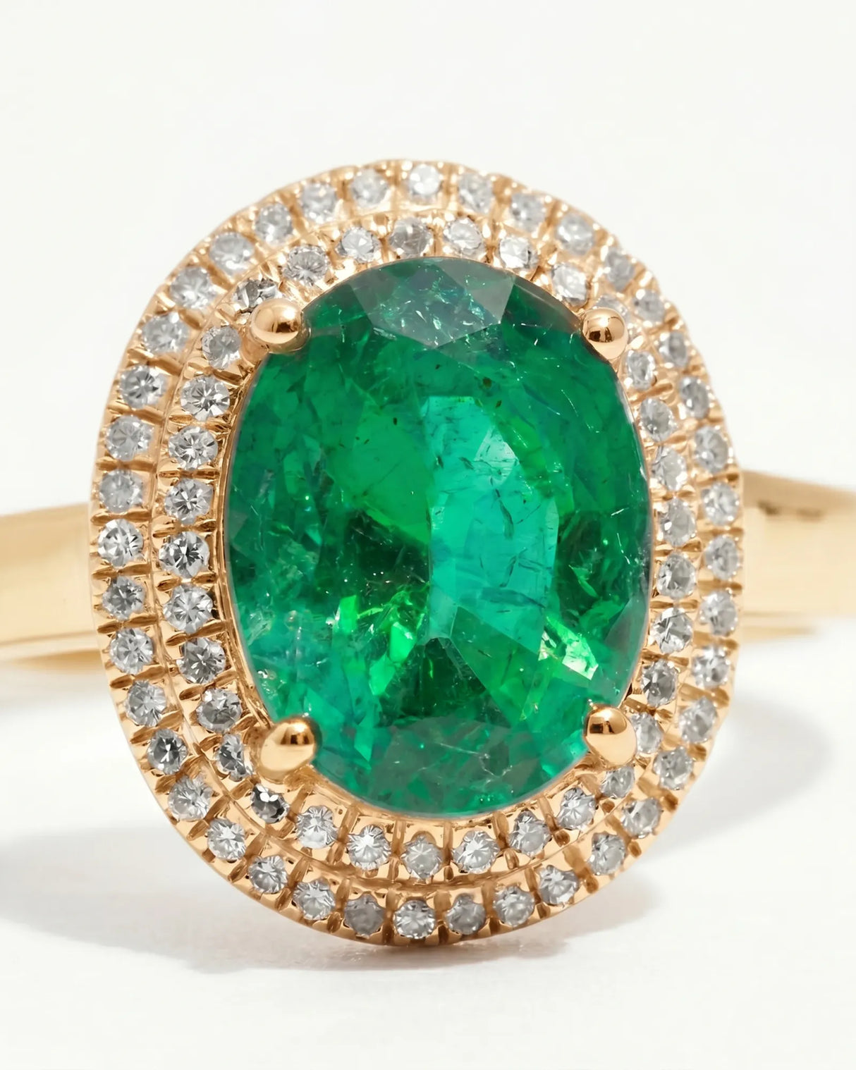 Yellow gold natural emerald diamond halo ring with deep green center stone | SARATTI