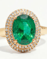 Yellow gold natural emerald diamond halo ring with deep green center stone | SARATTI