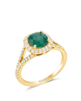 Yellow gold natural emerald engagement ring with moissanite halo, split shank, and curved wedding band | SARATTI