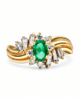 Yellow gold natural emerald ring with asymmetrical diamond halo design | SARATTI