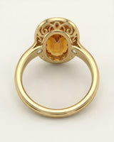 Yellow gold oval Topaz setting with diamond inner halo | SARATTI